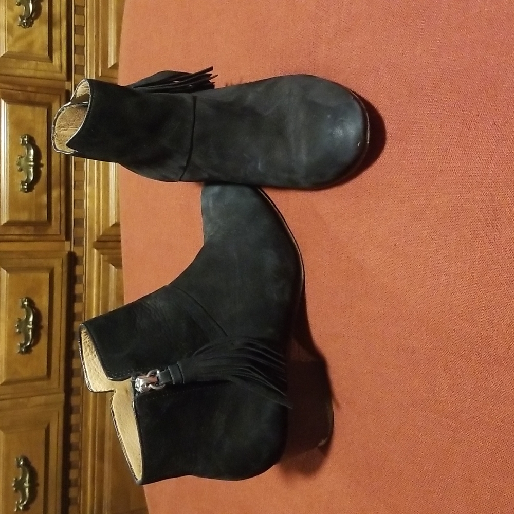 Used size 6 Coach Ankle Boots with tassels